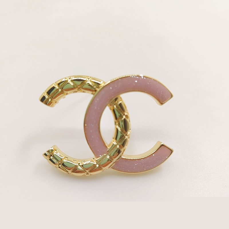 Ch*el brooches